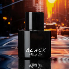 Kenneth Cole Black spray action in hand demonstrating convenient on-the-go refresh