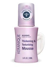 Keranique front packaging showing volumizing mousse benefits and size