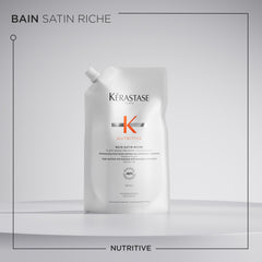 KÉRASTASE shampoo creating gentle lather on wet hair for softening