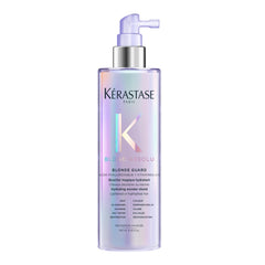 KÉRASTASE bottle front packaging showing product and benefits