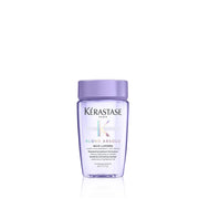KÉRASTASE front bottle shot showing compact travel size and brightening benefit