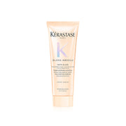 KÉRASTASE front bottle view showing compact travel-size and brand shine