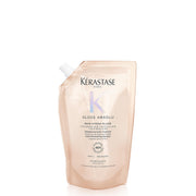 KÉRASTASE front bottle showing product identity and glossy finish benefit