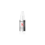KÉRASTASE tube front view showing travel-size repair treatment and benefits