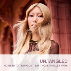 KEVIN.MURPHY UN.TANGLED spray nozzle close-up delivering fine mist for easy detangling