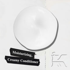 Kiehl's creamy conditioner texture close-up highlighting smooth application