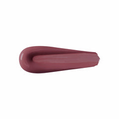 Kiko Milano lipstick applied on model in natural light demonstrating wearable, polished rosy-brown finish
