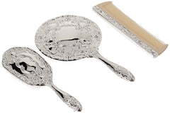 Kingsley brush and comb detail showing weighted metal handles for better control