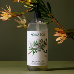 Koala Eco 34oz bottle held to show scale and easy refill benefit