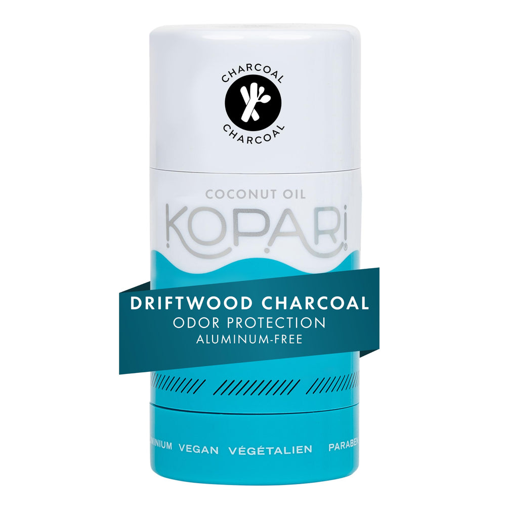 Kopari front packaging showing driftwood charcoal scent and clear benefits