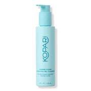 Kopari front packaging showing cleanser bottle, clear branding and benefit