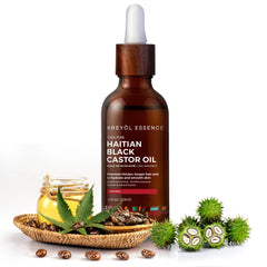 KREYÒL ESSENCE pouring oil close-up highlighting rich texture and moisturizing benefit