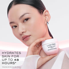 Lancôme cream applied on back of hand demonstrating fast absorption benefit
