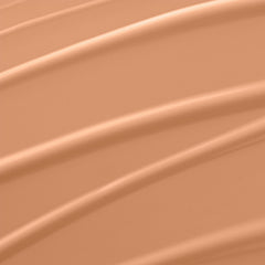Lancôme Rénergie Lift bottle with cap removed dispensing foundation demonstrating smooth blendability