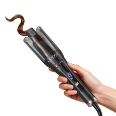 LANDOT front view of curler showing polished barrel and ergonomic grip for effortless styling