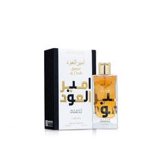 Lattafa Ameer Al Oud close-up of glass bottle highlighting rich amber color and elegance