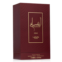Lattafa Ansaam Gold flatlay of notes and ingredients showing fruity and floral facets