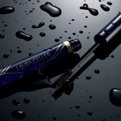 LAURA GELLER NEW YORK mascara texture swipe showing creamy pigment for vivid black