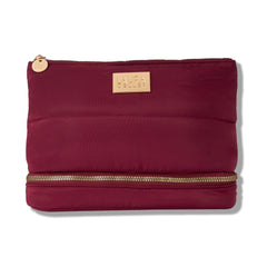 LAURA GELLER front view of burgundy quilted makeup bag showing shape and size