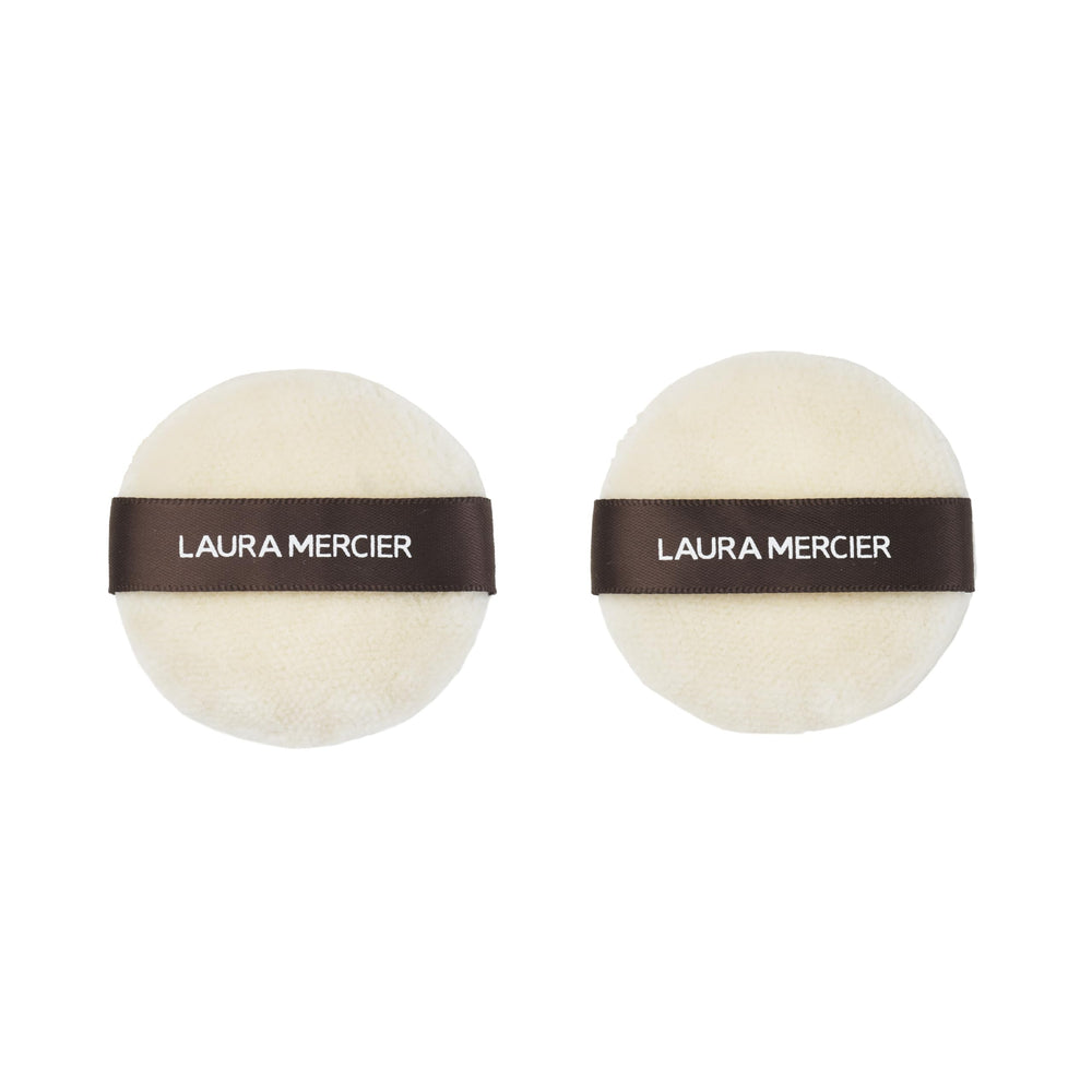 Laura Mercier velour puff front view showing plush surface and neat two-pack packaging for easy use