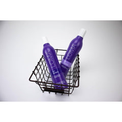 Loma violet shampoo bottle cap and label detail highlighting clean ingredient benefits