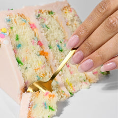 LONDONTOWN polish being applied on nails for effortless, salon-like finish