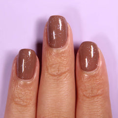 LONDONTOWN kur top coat close-up of iridescent droplet, adds luminous dimension