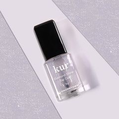 LONDONTOWN kur top coat on finished manicure, enhances gloss and protects color