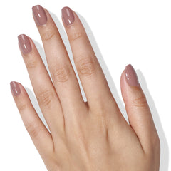 Hand swatch wearing Chai shade showing LONDONTOWN polish wearable neutral benefit