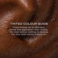 Loving Tan being applied with a mitt showing streak-free blending benefit