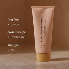 Lux Unfiltered applying lotion on arm for even color