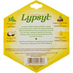Lypsyl in-hand lifestyle shot demonstrating one-handed slide application for on-the-go moisture