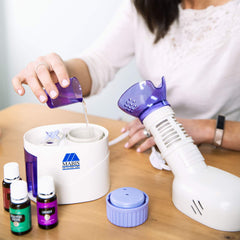 MABIS aromatherapy tray detail showing oil reservoir for scented steam option
