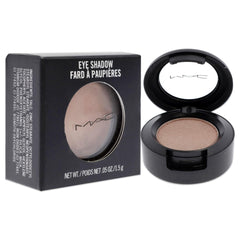 MAC Naked Lunch swatch on skin illustrating luminous pink shimmer for buildable intensity