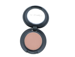 MAC Soft Brown texture close-up displaying fine-milled powder for smooth blend
