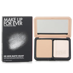 Make Up For Ever open compact displaying powder and applicator for easy touch-ups