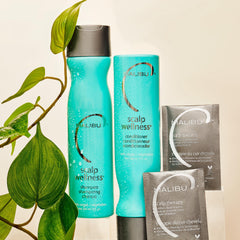 Malibu C shampoo lathered on hair demonstrating gentle cleansing