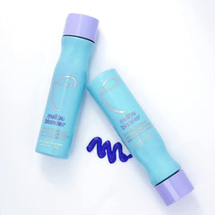 Malibu C shampoo in use on wet hair showing even application and quick toning effect