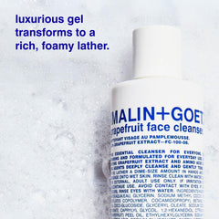 Close-up of MALIN+GOETZ label highlighting product name and gentle formula benefits