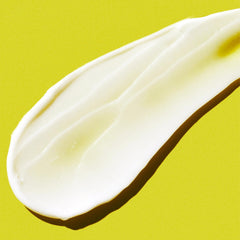 MALIN+GOETZ lotion texture on hand demonstrating lightweight absorbency