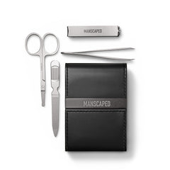 MANSCAPED open case showing four-piece kit and organized storage benefit