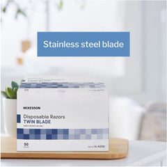 McKesson close-up of twin stainless-steel blades highlighting clean shave performance
