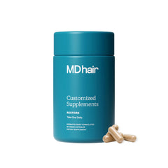 MDhair bottle front view showing supplement packaging and clear branding benefits