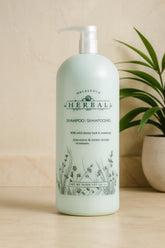 Melaleuca Herbal Shampoo front bottle showing label and pump for easy dispensing and value