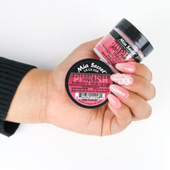 Close-up of Mia Secret powder texture to show fine mill finish and easy bead control