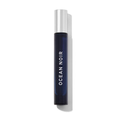 Michael Malul travel spray front view showing compact bottle and branding for easy packing