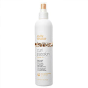 milk_shake front packaging showing bottle and brand, highlights salon-grade benefits