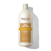 Mizani front bottle showing label and benefits for defined curls