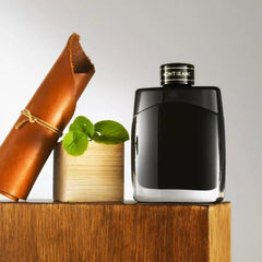 Mont Blanc Legend bottle next to coin showing 100 ml size for travel benefit