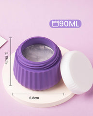 Mrsdry jar held in hand to show scale and convenient carry-on sizing